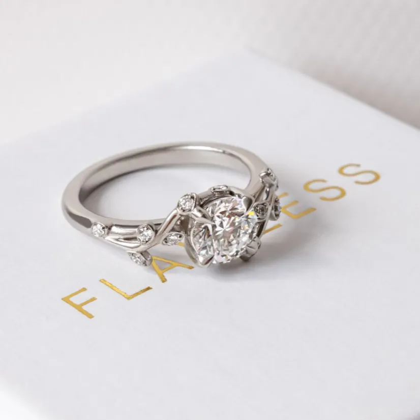 A Garden of Gems Engagement Ring with Flower Design